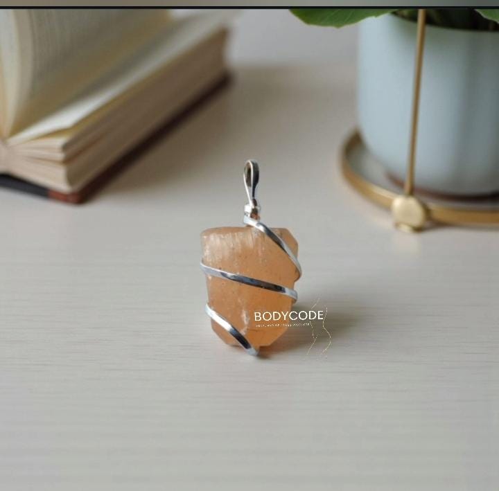 Orange Selenite Tumble pendant 
₹- 1500/- + certificate